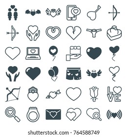 Set of 36 valentine filled and outline icons such as heart, bow, love letter, heart on hand, women couple, heart angel wings, gift, rose, love word, ring in box