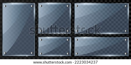 Set 3d realistic glass or plastic frame hanging with metal holders isolated on transparent background. Empty photo frame template, banner plexiglass holder mockup, rectangular name plate
