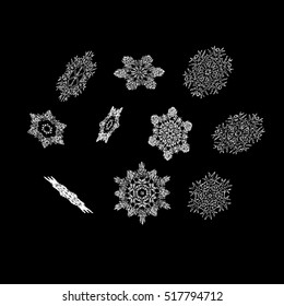 Set of 3d shiny snowflakes on black background. Winter collection. Vector christmas illustration.