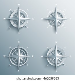 Set of 3d wind roses in paper and origami style. Modern compass and star icon illustration.