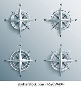 Set of 3d wind roses in paper and origami style. Modern compass and star icon illustration.