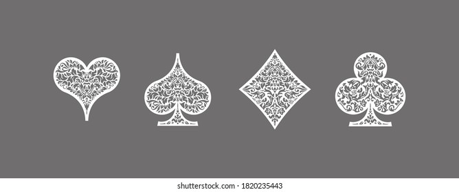 Set 4 aces Playing card suits icons decoration pattern: diamonds, clovers, hearts spades template on gray background. Vintage Playing card suit ornament symbol pictogram ace casino for play poker game