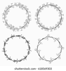 Set of 4 Black Hand Drawn Decorative Outlined Wreaths, Branches, Laurels with Herbs, Plants and Flowers, Florals. Vector Illustration. Frames, Circles
