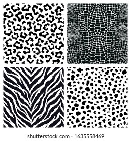 Set of 4 black and white animal fur, skin seamless patterns. Exotic backgrounds. Vector wallpapers.