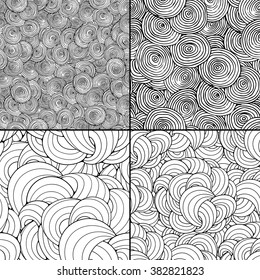 Set of 4 black and white doodle seamless patterns. Vector illustration