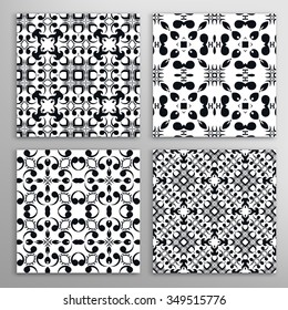 Set of 4 black and white seamless geometric square patterns set with repeating texture for fabric or paper print. Vector collection
