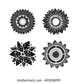 Set of 4 black zentangle flowers polynesian tattoo style. Vector images isolated on white background. Tribal flower.