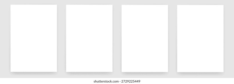 Set of 4 blank white poster mockups on gray background, realistic vertical paper frames for design presentation and portfolio display