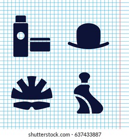 Set of 4 cap filled icons such as hat, cream tube