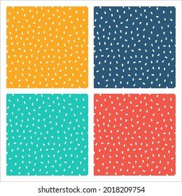 Set of 4 colorful seamless patterns with white sprinkles