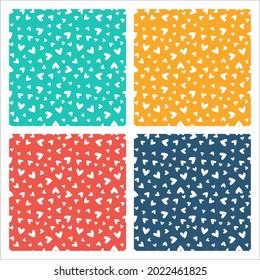 Set of 4 colorful seamless patterns with white hearts
