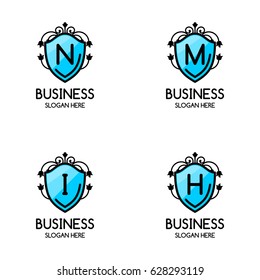 Set of 4, creative Blue symbol floral emblem , Elegant calligraphic ornament line art monogram logo design for photographer , Fashion & wedding photography logo design . vector illustration
