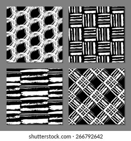 Set of 4 fantasy abstract seamless patterns made with ink. Freehand texture. Black and white modern background.