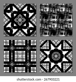 Set of 4 fantasy abstract seamless patterns made with ink. Vector freehand texture.Black and white modern background.