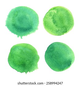 Set of 4 green circles painted in watercolor. Vector template for your design.