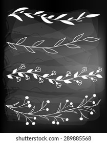Set of 4 hand drawn borders with leaves, flowers and berries on chalkboard background.