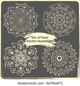 Set of 4 hand drawn mandalas. Vintage style elements with grunge effect.  Indian, asian, arabic, islamic, ottoman motif. Vector illustration. 