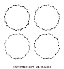 Set of 4 hand drawn spring wreaths isolated on white background, vector. Outline and silhouette frames with leaves. Doodle style.Collection of floral monogram frames.