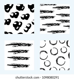 Set of 4 hand drawn trendy patterns with ink brush strokes.. Isolated on white backgrounds. Vector patterns for your design