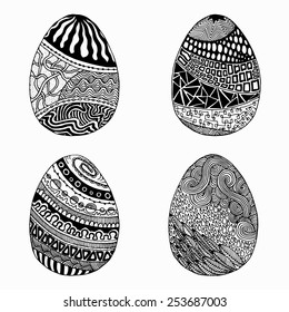 Set of 4 hand drawn zentangle easter eggs. Black and white vector