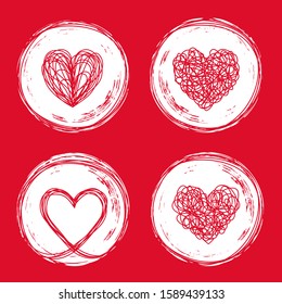 Set of 4 heart tangled grungy scribble in an ink circle hand drawn with brush. Isolated on white background. Vector illustration