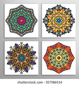 Set of 4 Mandala round ornaments. Isolated decorative elements for paper or fabric print, invitation cards or logo design. Tribal ethnic motifs, vector illustration