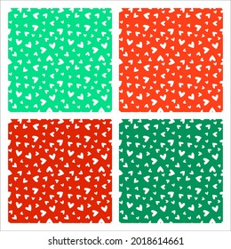 Set of 4 orange and green seamless patterns with white hearts