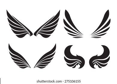 Set of 4 pair of decorative vector wings isolated on white.