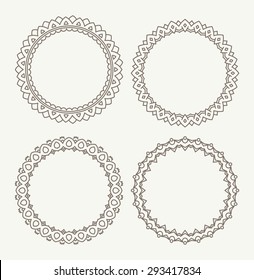 Set of 4 rich decorated calligraphic round frames.