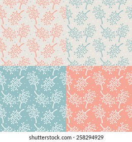 A set of 4 seamless hand drawn foliage patterns in four colours.