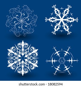 Set of 4 unique beautiful different snowflakes