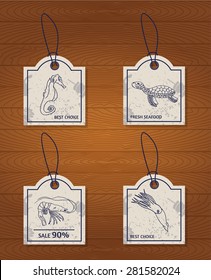 Set Of 4 Vintage Design Elements Seafood. Sea Horse, Turtle, Squid And Shrimp