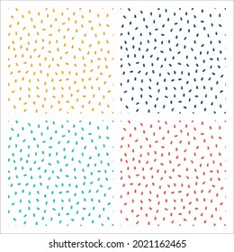 Set of 4 white seamless patterns with colorful sprinkles.