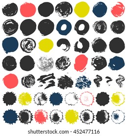 Set of 50 grungy artistic circles. Messy hand drawn shapes, drops and stains isolated on white background. Qualitative trace of real paint and ink textures. Trendy design elements