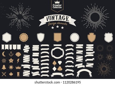  Set of 74 vintage design elements. Design elements for logos, badges, labels. Icons, ribbon banners, light rays. Template. Vector illustration.