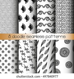 Set of 8 black and white doodle seamless patterns