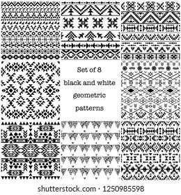 Set of 8 black and white ethnic geometric patterns, vector illustration