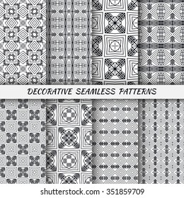 Set of 8 vertical seamless geometric patterns with repeating texture for fabric or paper print. Black and white vector collection
