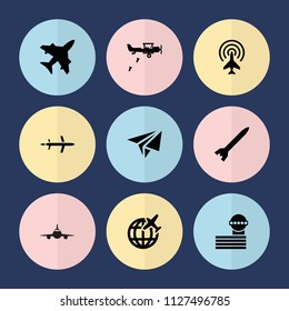 Set of 9 airplane filled icons such as airport tower, plane, rocket bomb, military plane