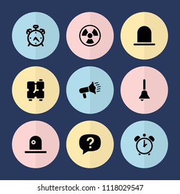 Set of 9 alert filled icons such as alarm, siren, bell, exclamation, megaphone