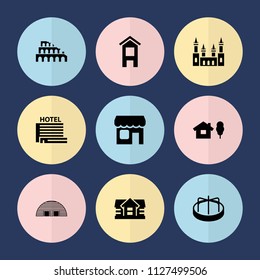 Set of 9 building filled icons such as house, child playground carousel, house and tree, shop, hotel, barn, coliseum, castle