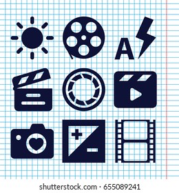Set of 9 camera filled icons such as heart with camera, movie clapper, movie tape, camera shutter, light exposure, contrast