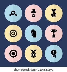 Set of 9 champion filled icons such as trophy, medal, number 1 medal, medal with star, award