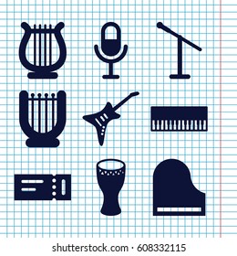 Set of 9 concert filled icons such as ticket, microphone, piano, guitar, harp
