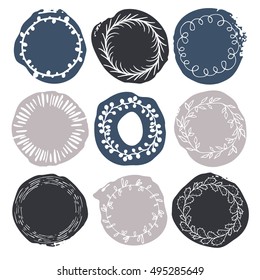 Set of 9 decorative wedding or romantic elements. Watercolour hand drawn circles with floral wreaths. Stylish templates. Trendy pastel black, grey and blue shapes with rough edges isolated on white