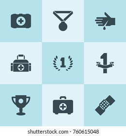 Set of 9 first filled icons such as award, trophy, first aid kit, patch, blood on hand, medal, number 1, medical bag