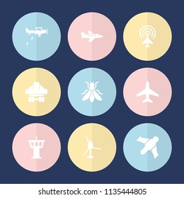 Set of 9 flight filled icons such as airport tower, cargo plane back view, plane, helicopter, military plane, hang glider
