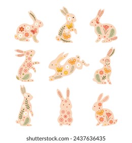 Set of 9 floral Easter bunnies. Vector illustration in flat style is isolated on white background.