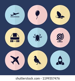 Set of 9 fly filled icons such as plane taking off, dove, beetle, globe, plane, balloon, butterfly, rocket