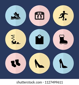 Set of 9 foot filled icons such as boot, baby socks, woman shoe, sandals, football player, floor scale, floor scales